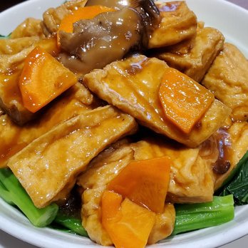 Congee Queen - Deep-fried tofu, stir-fried with shiitake, carrots, and special brown sauce, yu choy on the bottom - Chinese Near Me - Mississauga, Ontario Congee Queen - Deep-fried tofu, stir-fried with shiitake, carrots, and special brown sauce, yu choy on the bottom - Chinese Near Me - Mississauga, Ontario