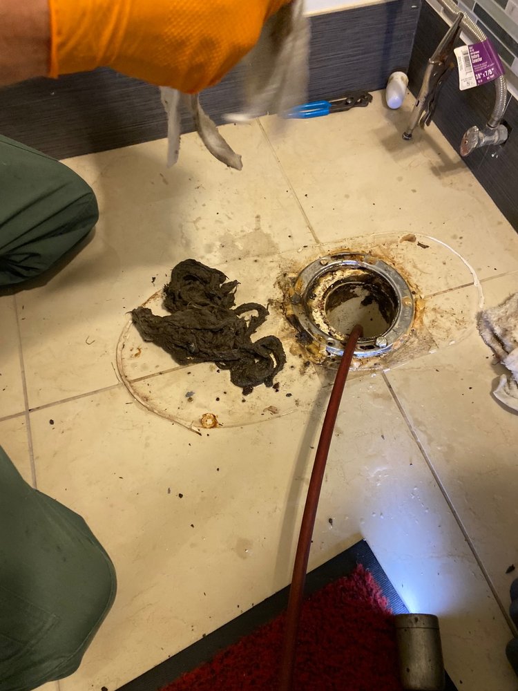 Slide of All American Jetting & Drain Services