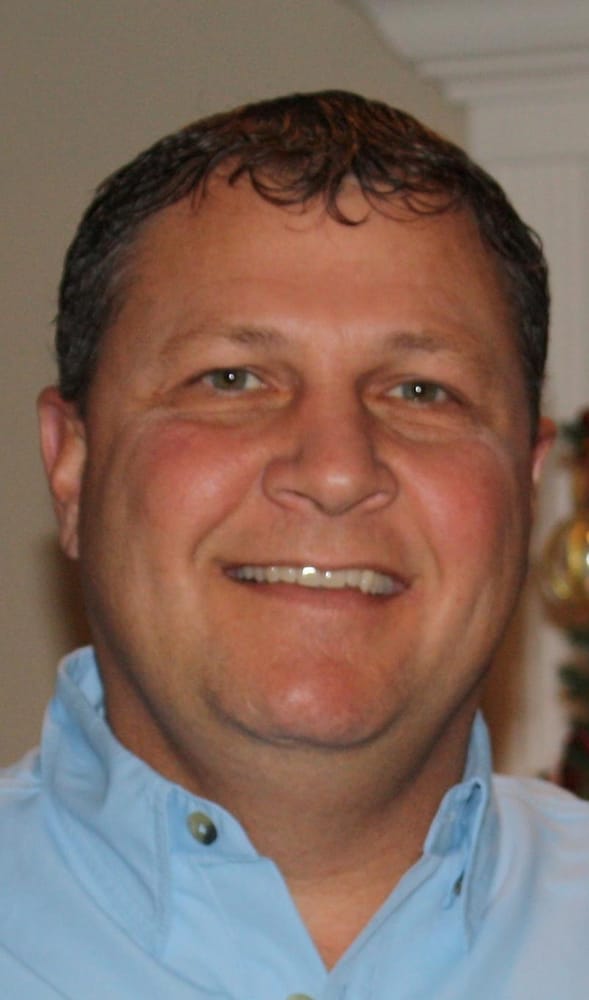 Slide of Brian McKenzie Roofing