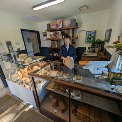 Counter Cheesemongers - Nora bagging up some tasty sandwiches