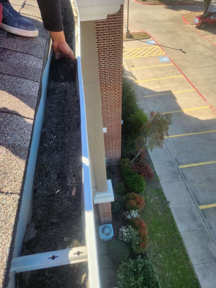 Slide of Macaw Roofing