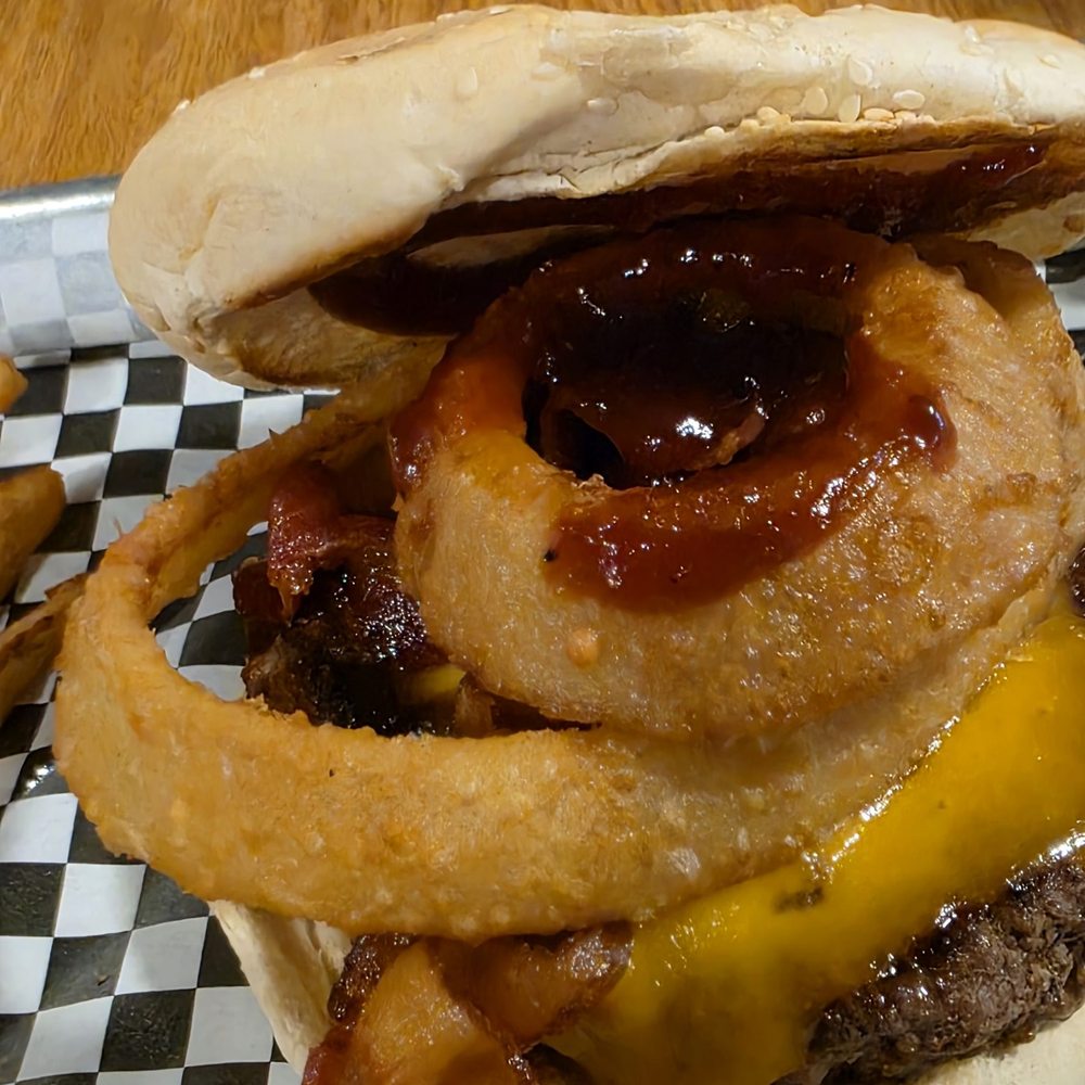 Lew's Restaurant - Their amazing onion rings inside the burger. - Pizza Near Me - Roanoke, Virginia Lew's Restaurant - Their amazing onion rings inside the burger. - Pizza Near Me - Roanoke, Virginia