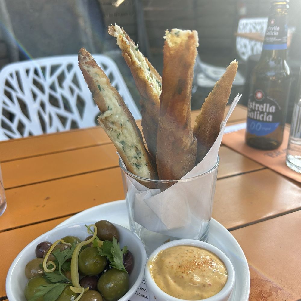 Bravas Bar de Tapas - F Crispy Bacalao Cigarillos, Marinated Olives, Lemon Zest & Romesco Allioli** - Spanish Near Me - Healdsburg, California