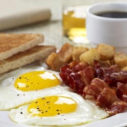 The Bistro - Daybreak fried eggs made to order and served with bacon, homefries and toast, it is the perfect way to start your morning.