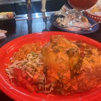 Los Cuates - Stuffed sopapilla with beef, topped green chile. So good! - New Mexican Cuisine Near Me - Albuquerque, New Mexico Los Cuates - Stuffed sopapilla with beef, topped green chile. So good! - New Mexican Cuisine Near Me - Albuquerque, New Mexico