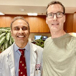 Raghu Murthy, MD - Retina Eye Specialists - Dr. Murthy and Larry Cook - 2023. Eyes are still in excellent health!