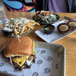 OG Burger, house fries, kale career with crispy chicken, scotch egg (from the Coat of Arms pop-up in February) OG Burger, house fries, kale career with crispy chicken, scotch egg (from the Coat of Arms pop-up in February)