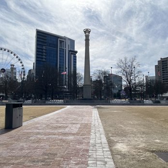 Centennial Olympic Park - Walking towards SkyView Atlanta Ferris wheel and water fountains - Parks Near Me - Atlanta, Georgia