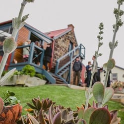 BushBank Wedding Venue - Landscaped and manicured gardens surround the property. Blue stone cottage.
