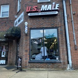U S Male Men's Hair Care Center - Exterior of US Male Modern Barbershop.