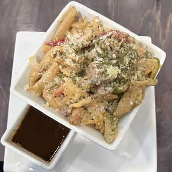 Ocho Rios Jerk Spot - Delicious Rasta Pasta with chicken and a side of oxtails gravy - Caribbean Near Me - Goodyear, Arizona Ocho Rios Jerk Spot - Delicious Rasta Pasta with chicken and a side of oxtails gravy - Caribbean Near Me - Goodyear, Arizona