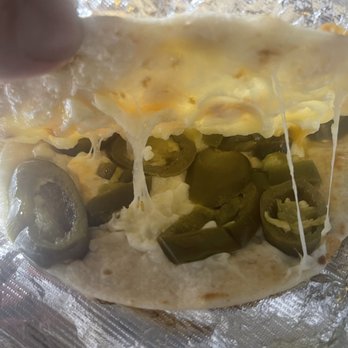 Fresh Soft Taco - a hand holding a piece of food - Mexican Near Me - Rego Park, New York