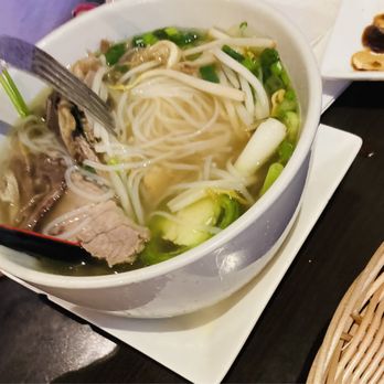 Pho District 1 - a bowl of noodles with meat and vegetables - Bubble Tea Near Me - Lubbock, Texas Pho District 1 - a bowl of noodles with meat and vegetables - Bubble Tea Near Me - Lubbock, Texas
