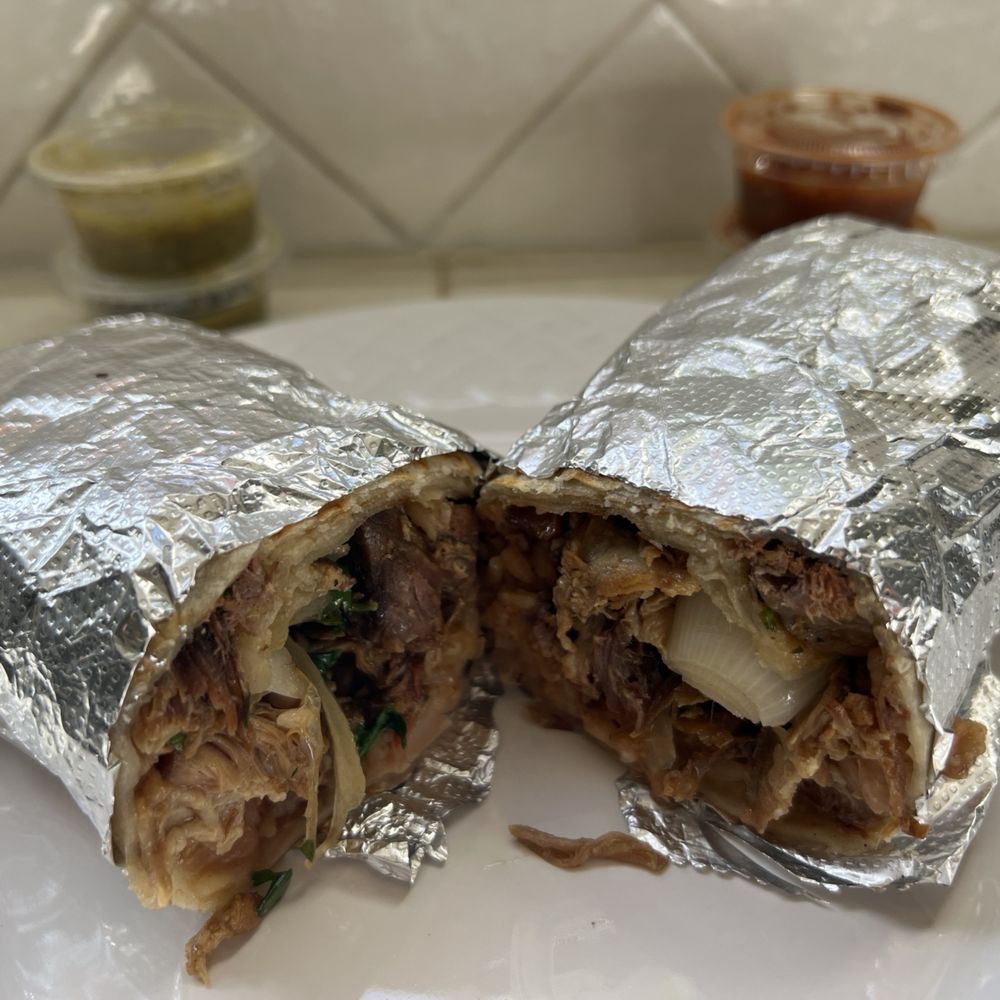 Los Taquero Mucho - 1/7/23 Burrito - half carnitas and half asada. Salsa Verde and rojo on the side - Caterers Near Me - Montebello, California Los Taquero Mucho - 1/7/23 Burrito - half carnitas and half asada. Salsa Verde and rojo on the side - Caterers Near Me - Montebello, California