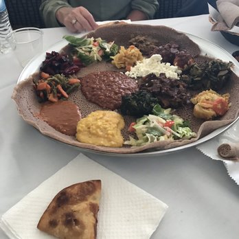 Ibex Ethiopian Bar & Restaurant - 2 Piece Sambusa with Mahberawi and Vegetarian Combo - Ethiopian Near Me - Columbus, Ohio Ibex Ethiopian Bar & Restaurant - 2 Piece Sambusa with Mahberawi and Vegetarian Combo - Ethiopian Near Me - Columbus, Ohio