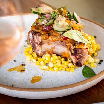 Cassava - A pork chop to remember... with stone fruit salsa and Brentwood corn succotash - Cafes Near Me - San Francisco, California Cassava - A pork chop to remember... with stone fruit salsa and Brentwood corn succotash - Cafes Near Me - San Francisco, California