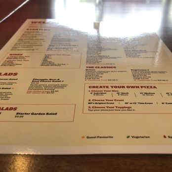 Boston Pizza - a menu on a table - Pizza Near Me - Edmonton, Alberta Boston Pizza - a menu on a table - Pizza Near Me - Edmonton, Alberta