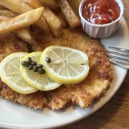 Chicken schnitzel and fries Chicken schnitzel and fries