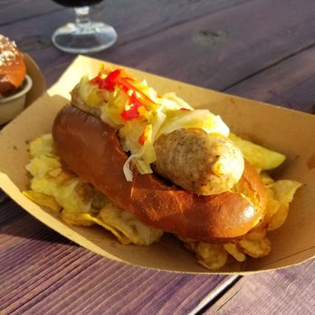 The Rake at Admiral Maltings - Bratwurst - big pickle behind it all not pictured. - Beer Bar Near Me - Alameda, California The Rake at Admiral Maltings - Bratwurst - big pickle behind it all not pictured. - Beer Bar Near Me - Alameda, California