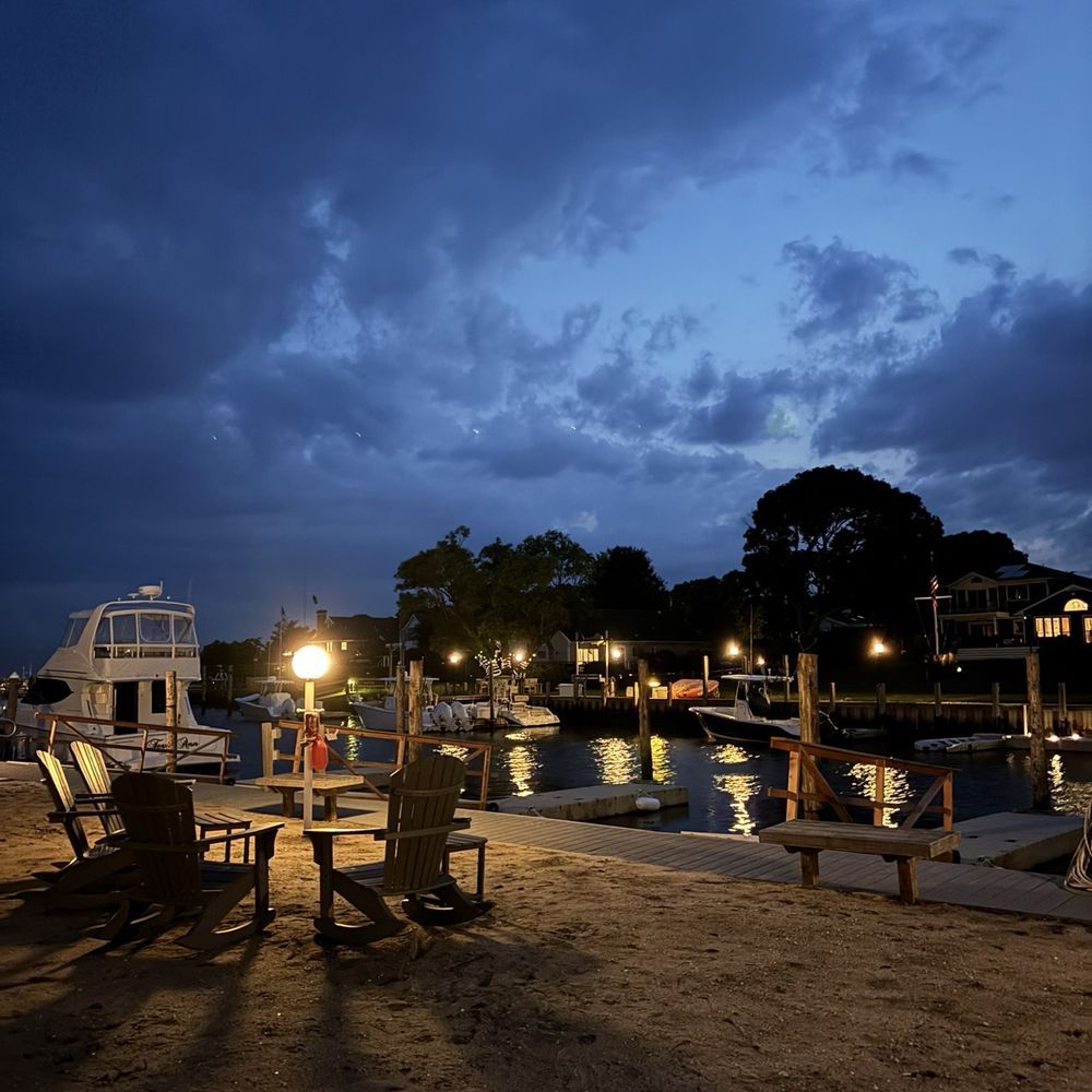 The Penny Lane - Sand and Adirondack chairs by the docks - Hotels Near Me - Hampton Bays, New York The Penny Lane - Sand and Adirondack chairs by the docks - Hotels Near Me - Hampton Bays, New York