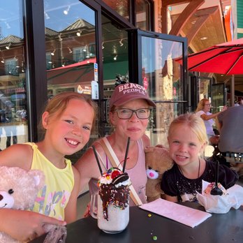 The Island Creamery - Shared an outside table with a nice lady since there was so little seating. She offered to take this photo! - Ice Cream & Frozen Yogurt Near Me - Pigeon Forge, Tennessee