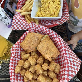 Platte River Bar and Grill - Chicken Caesar melt with tots - Bars Near Me - Littleton, Colorado Platte River Bar and Grill - Chicken Caesar melt with tots - Bars Near Me - Littleton, Colorado