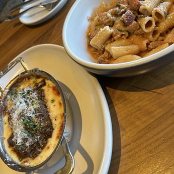 North Italia - Lasagna Bianca al Forno (Left) and Spicy Rigatoni Vodka (Right) - Italian Near Me - Dunwoody, Georgia