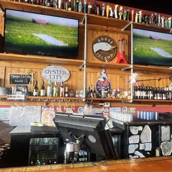 Midtown Pizza Kitchen - a bar with several televisions on the wall - Pizza Near Me - Prattville, Alabama