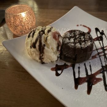 Vino & Vinyl - Chocolate lava cake made to ordered-so fresh and amazing - Wine Bars Near Me - Sugar Land, Texas Vino & Vinyl - Chocolate lava cake made to ordered-so fresh and amazing - Wine Bars Near Me - Sugar Land, Texas