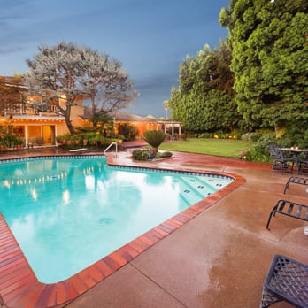 Garrett Chan - Compass - Check out the twilight view of the Backyard this Arcadia Ranch Home! - Real Estate Agents Near Me - Pasadena, California