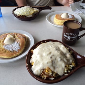 Flap Jacks - Flapjacks with a skillet side of eggs scrambled with hash browns and topped with sausage gravy. - Breakfast & Brunch Near Me - Lebanon, Indiana
