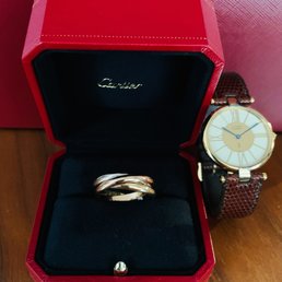 My new Trinity ring and my Must de Cartier watch, still on the band that was replaced 34 years ago. Same exceptional service for both.