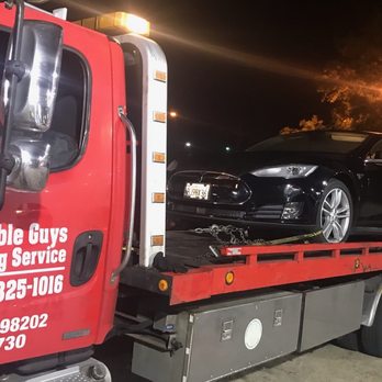 Reliable Guys Towing Service - Picking up a black Tesla S-Series from dealership near NW St Louis - Towing Near Me - St. Louis, Missouri Reliable Guys Towing Service - Picking up a black Tesla S-Series from dealership near NW St Louis - Towing Near Me - St. Louis, Missouri
