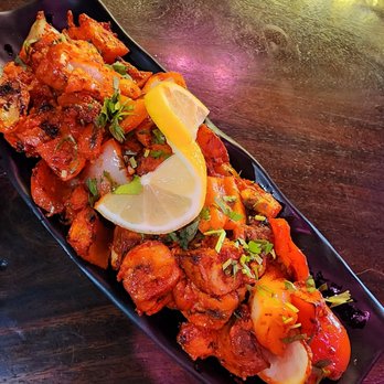 Bollywood Restaurant - a plate of food on a table - Indian Near Me - Longueuil, Quebec Bollywood Restaurant - a plate of food on a table - Indian Near Me - Longueuil, Quebec
