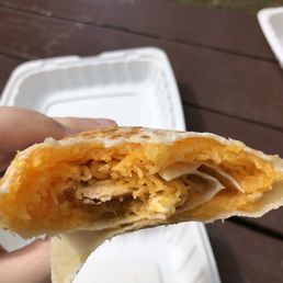 Classic burrito with chicken. Globs of half-melted cheese with a few pieces of chicken. $15. Classic burrito with chicken. Globs of half-melted cheese with a few pieces of chicken. $15.