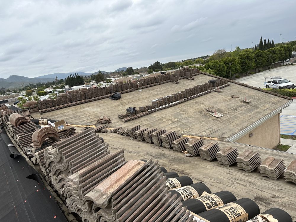 Slide of OMC Roofing