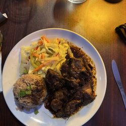 Island Soul - Brown stewed chicken, rice & peas and cabbage.