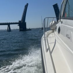 Captain Morgan Charters - Sailboat going through drawbridge: