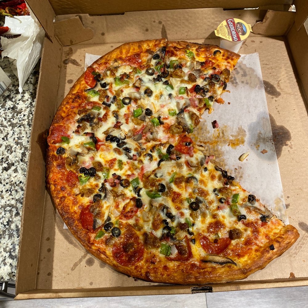 Arlon's Carryout & Delivery - a half eaten pizza - Food Delivery Services Near Me - Baltimore, Maryland