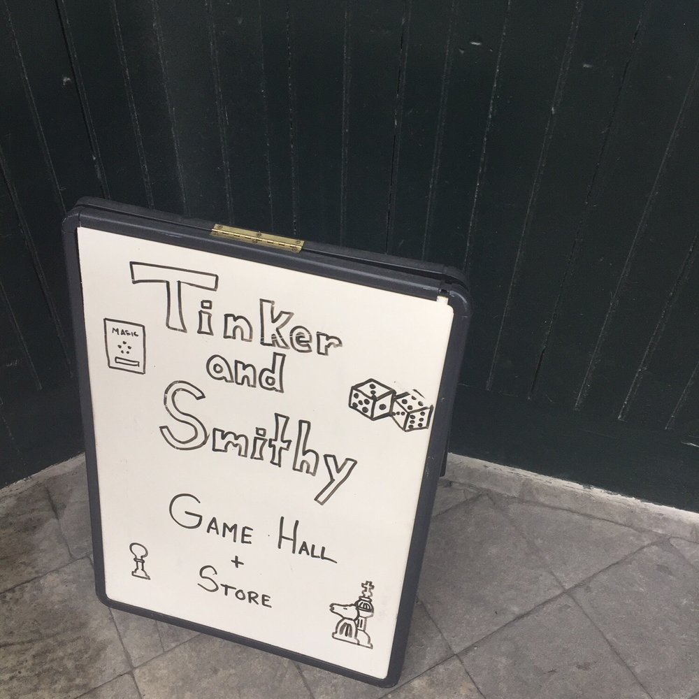 Tinker and Smithy Game Store - The sign that leads the way - Tabletop Games Near Me - Middlebury, Vermont Tinker and Smithy Game Store - The sign that leads the way - Tabletop Games Near Me - Middlebury, Vermont