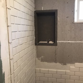 A Specialty Construction Services - Uneven tile that was laid that had to be removed - Kitchen & Bath Near Me - El Cajon, California