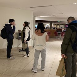 Husky Union Building - Line of people waiting for the only working microwave.