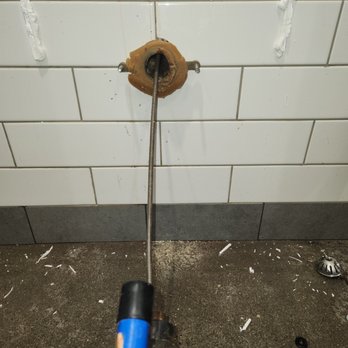 Advanced Plumbing Solutions  - Angering urinal drain line. - Plumbing Near Me