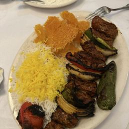 Shish kebob plate with half rice half tadig