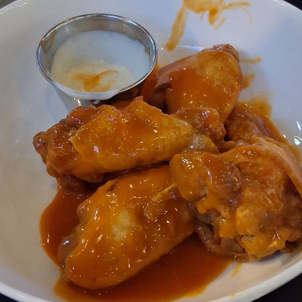 Chez Adele - Buffalo Wings with a delicious dipping sauce. - American Near Me - Chicago, Illinois Chez Adele - Buffalo Wings with a delicious dipping sauce. - American Near Me - Chicago, Illinois