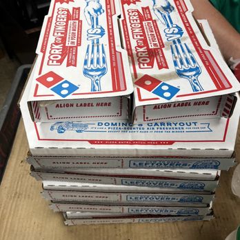 Domino's Pizza - a stack of domino's pizza boxes - Chicken Wings Near Me - Jacksonville, Florida Domino's Pizza - a stack of domino's pizza boxes - Chicken Wings Near Me - Jacksonville, Florida