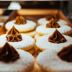 CAO Bakery & Cafe - A delicious dessert in a display.