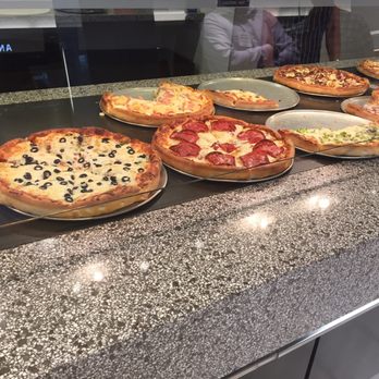 Verona Pizza - a variety of pizzas on display - Pizza Near Me - Calgary, Alberta