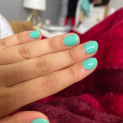 Mint Nails & Spa Lounge - Super uneven coats on my nails you can see where the second coat ends on top of my first.