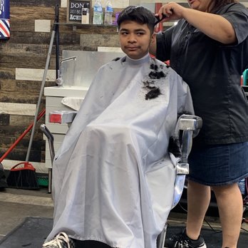 Moe's Barbershop - My son getting his hair cut - Barbers Near Me - Phoenix, Arizona Moe's Barbershop - My son getting his hair cut - Barbers Near Me - Phoenix, Arizona